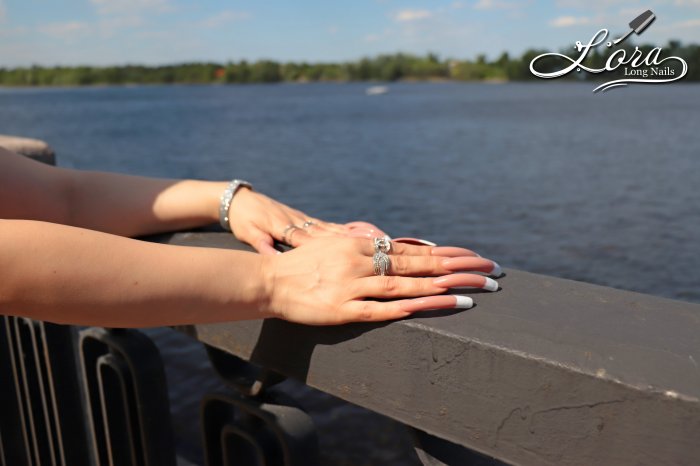 Photo session of long nails on the embankment of the Dnieper river in Kiev