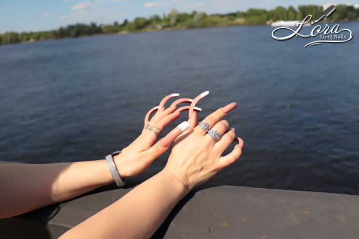 Photo session of long nails on the embankment of the Dnieper river in Kiev