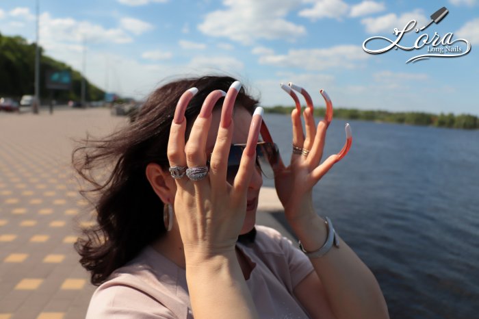 Photo session of long nails on the embankment of the Dnieper river in Kiev