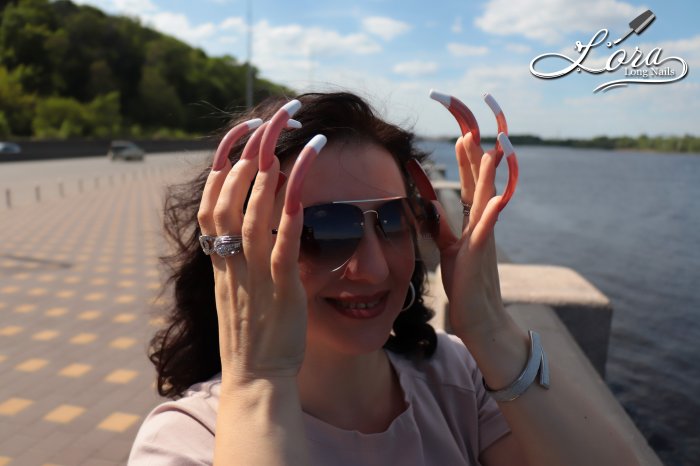 Photo session of long nails on the embankment of the Dnieper river in Kiev